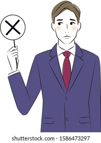 Businessman holding the wrong sign