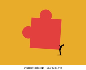 Businessman holds the final piece of a jigsaw puzzle