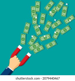 A businessman holds a magnet to attract banknotes. investment attraction concept