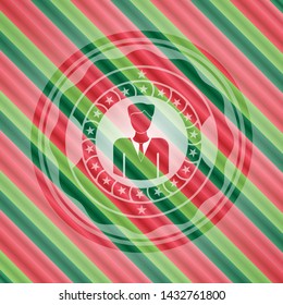 businessman icon inside christmas colors style emblem.
