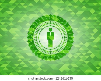 businessman icon inside green emblem with mosaic background