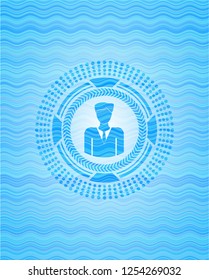 businessman icon inside light blue water wave emblem.