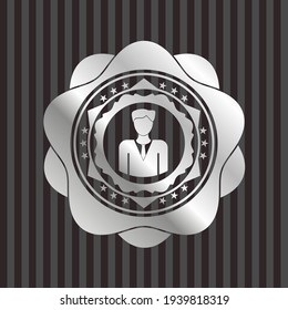 businessman icon inside silver shiny emblem. 