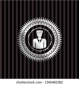 businessman icon inside silvery emblem