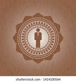 businessman icon inside vintage wooden emblem