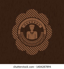 businessman icon inside wooden emblem. Vintage.