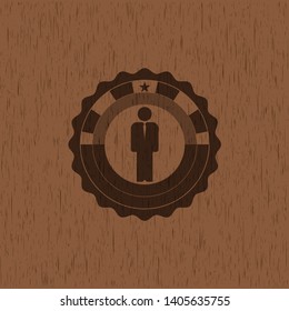 businessman icon inside wooden emblem. Retro