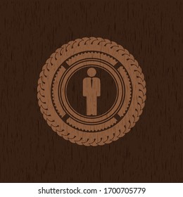 businessman icon inside wooden emblem. Retro