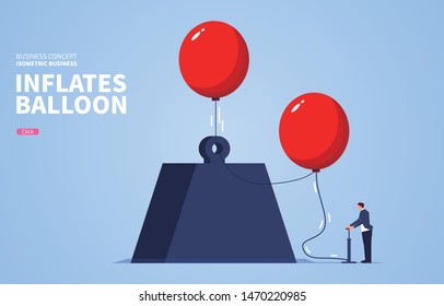 Businessman inflates balloons to pull up huge iron blocks