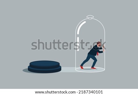Businessman inside the glass try to push so hard to break boundary. Business constraints or stagnant, prohibition or difficulty prevent from improvement or success.