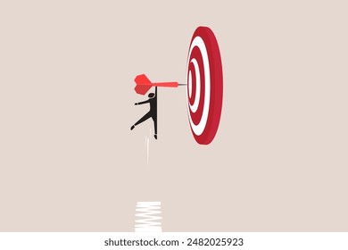 Businessman jump with arrow to target and successfully. advancement in career or business growth concept. Aspiration and motivation