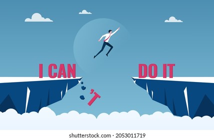 Businessman jumping over cliffs for I can do it, good mindset and never give up concept