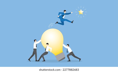 A businessman jumps from a light bulb to grab a star with supporting team. Business challenge, motivation, opportunity, investment, ambition, intention, reach a target, goal, idea and success concept.