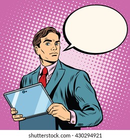 Businessman with laptop or tablet