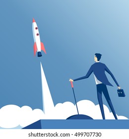 businessman launches rocket into the sky, employee performs the start-up of the spacecraft. Business startup concept