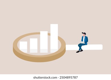 Businessman look at magnify market data chart and graph. concept Market research, marketing or advertising survey to launch product, competitors research or social media report