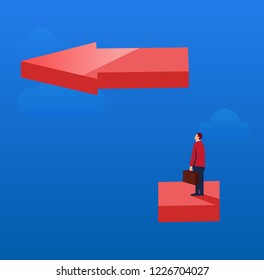 Businessman looking up at the high arrow