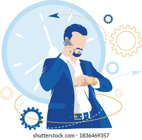 A businessman looks at a smartwatch