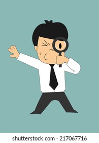 Businessman looks through a magnifying glass