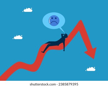 Businessman lying on a graph and having a nightmare