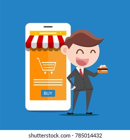 businessman or manager hold a credit card in his hand. online shop concept.