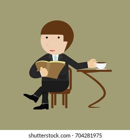A businessman or manager is sitting in a cafe at a table and reading 