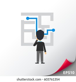 Businessman at maze with solution icon