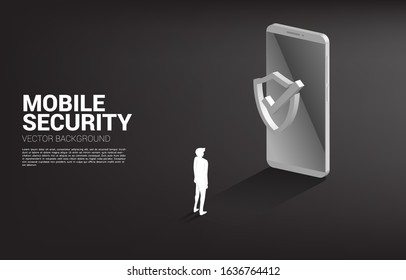 Businessman with mobile phone and Protection shield icon. concept of mobile guard security and cyber safety