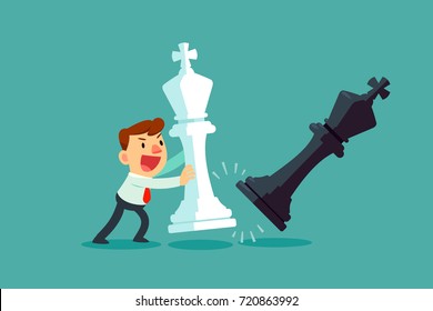 Businessman moving giant white chess piece against black chess piece. Business plan and strategy concept.