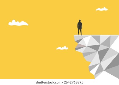 Businessman on the edge of a cliff