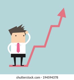 Businessman on growing graph
