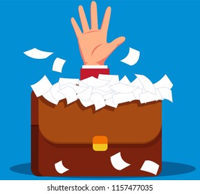 Businessman is overwhelmed by documents in briefcase