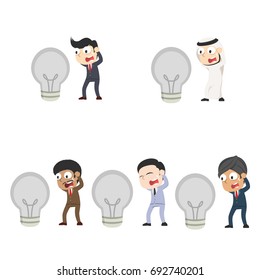 businessman in panic with dead bulb different race set