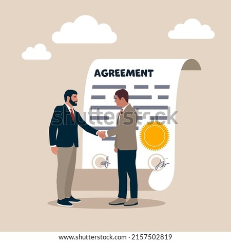 Businessman partner people shaking hand after signing business agreement document. Business deal, agreement or collaboration document, contract or success negotiation, executive handshaking concept.