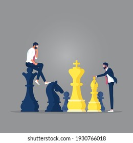 Businessman playing chess and try to find strategic position and tactic for long-term success plan or goal. Symbol of vision, competition, negotiation, planning and challenge.