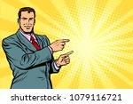 Businessman pointing finger at the side. Pop art retro vector illustration comic cartoon kitsch drawing