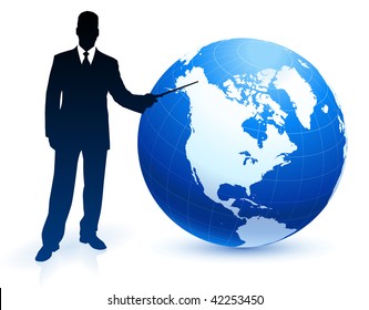 Businessman pointing at globe