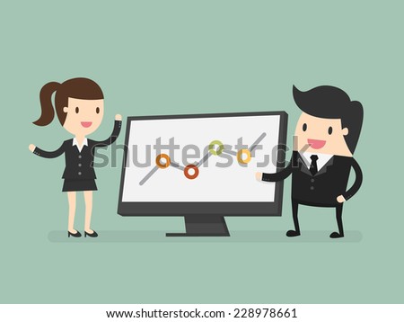 Businessman pointing at graph during discussion at meeting