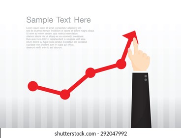 Businessman pointing at growth graph and business concept