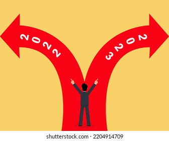 Businessman pointing out the path of 2022 and 2023. Business Plan with Creative Businessman showing Positive Growth