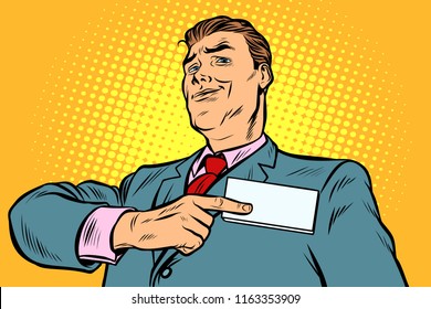 Businessman points at a name badge id. Pop art retro vector illustration vintage kitsch