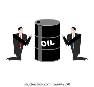 Businessman praying for oil. Prayer barrel of petroleum. Pray for fuel
