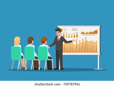 Businessman presenting financial and marketing data on presentation board. Business meeting and presentation concept.