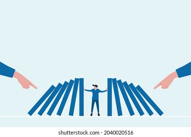 Businessman preventing domino effect in business concept. Business crisis management and solution concept. blocking	