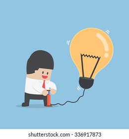 Businessman pumping air into idea balloon, VECTOR, EPS10 - Shutterstock ID 336917873
