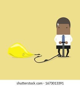  businessman pumps up a balloon of a light bulb.