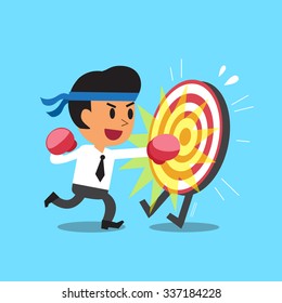 Businessman punching a target