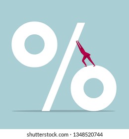 Businessman pushes percent sign. Isolated on blue background.