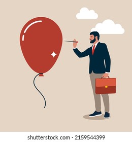 Businessman pushing needle to pop the balloon. Business concept