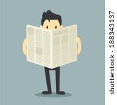 businessman reading a newspaper 